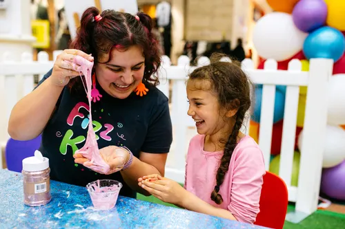 Kids playing with slime at a shopping center